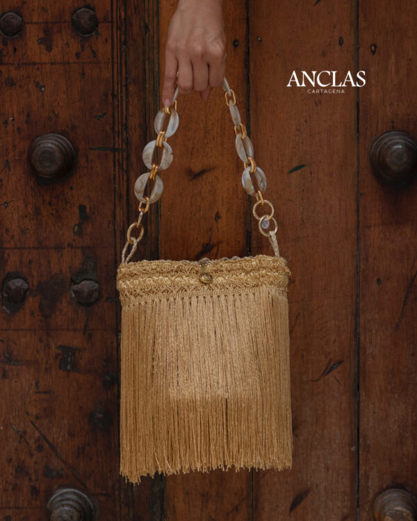 Bag hand flecos dorados